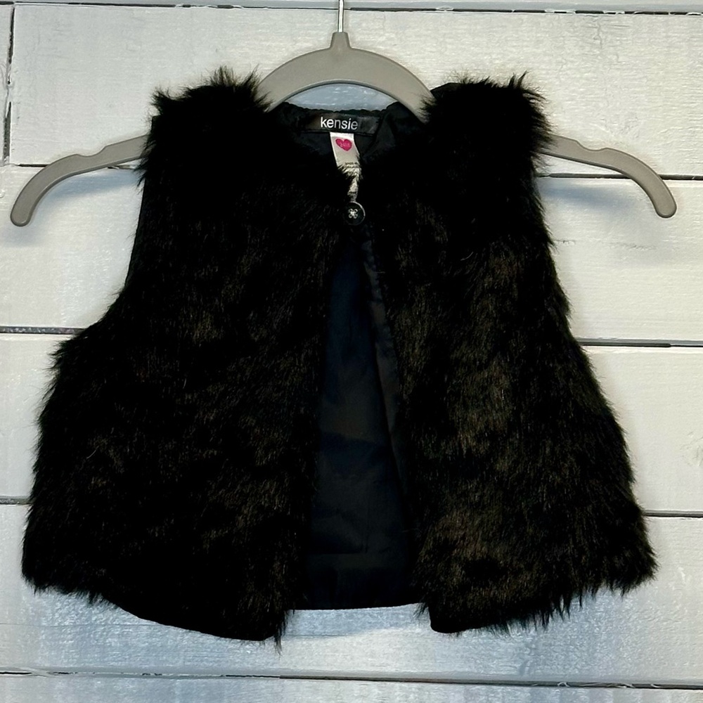 Faux fur and leather vest